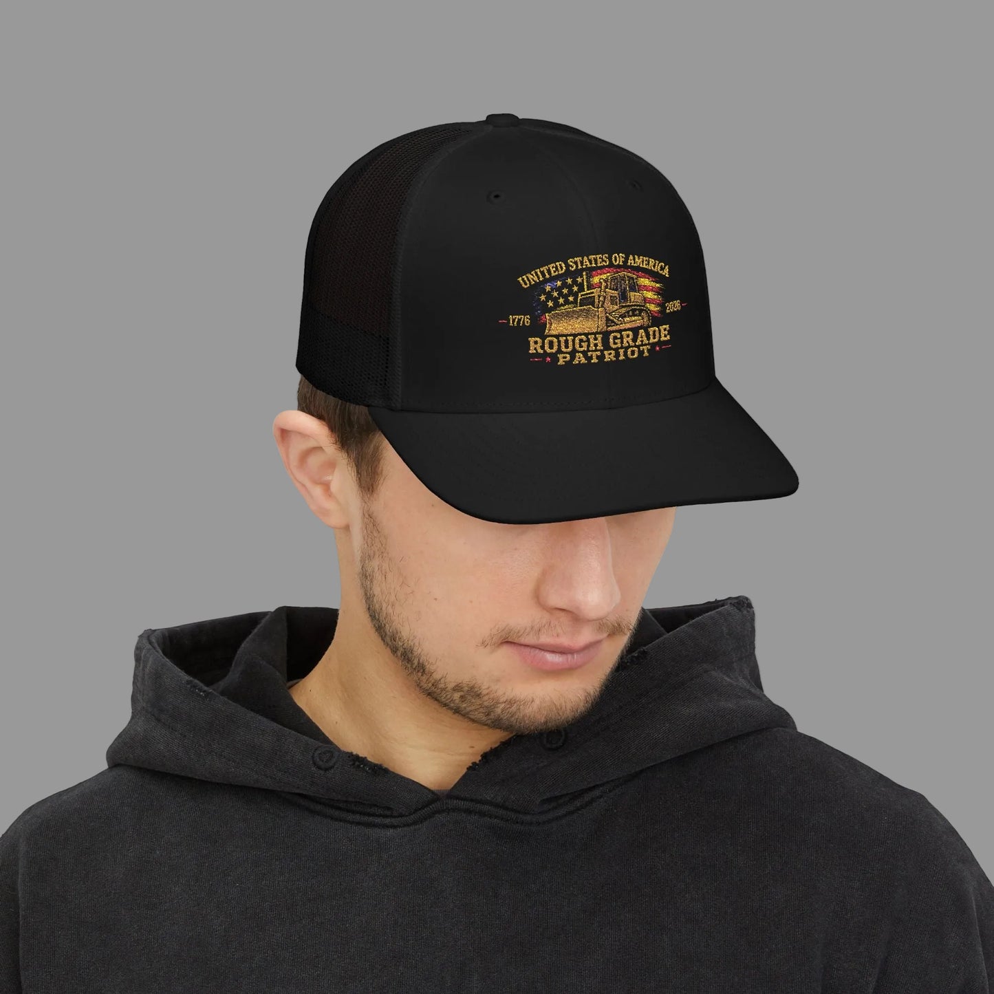 Man wearing a black cap with '432 Drill Crew' logo on a white background